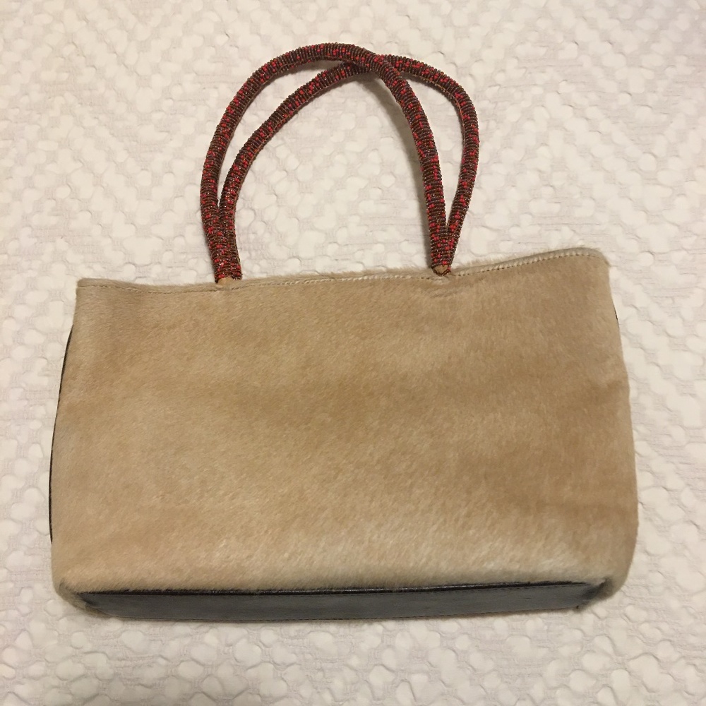 Tan fur and leather purse with beaded handles
